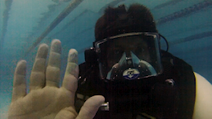 GoPro Image of Chet Tucker underwater with full face mask.
